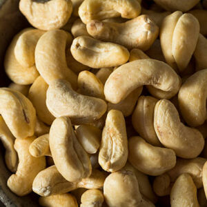 Raw organic white chashew nuts in a bowl